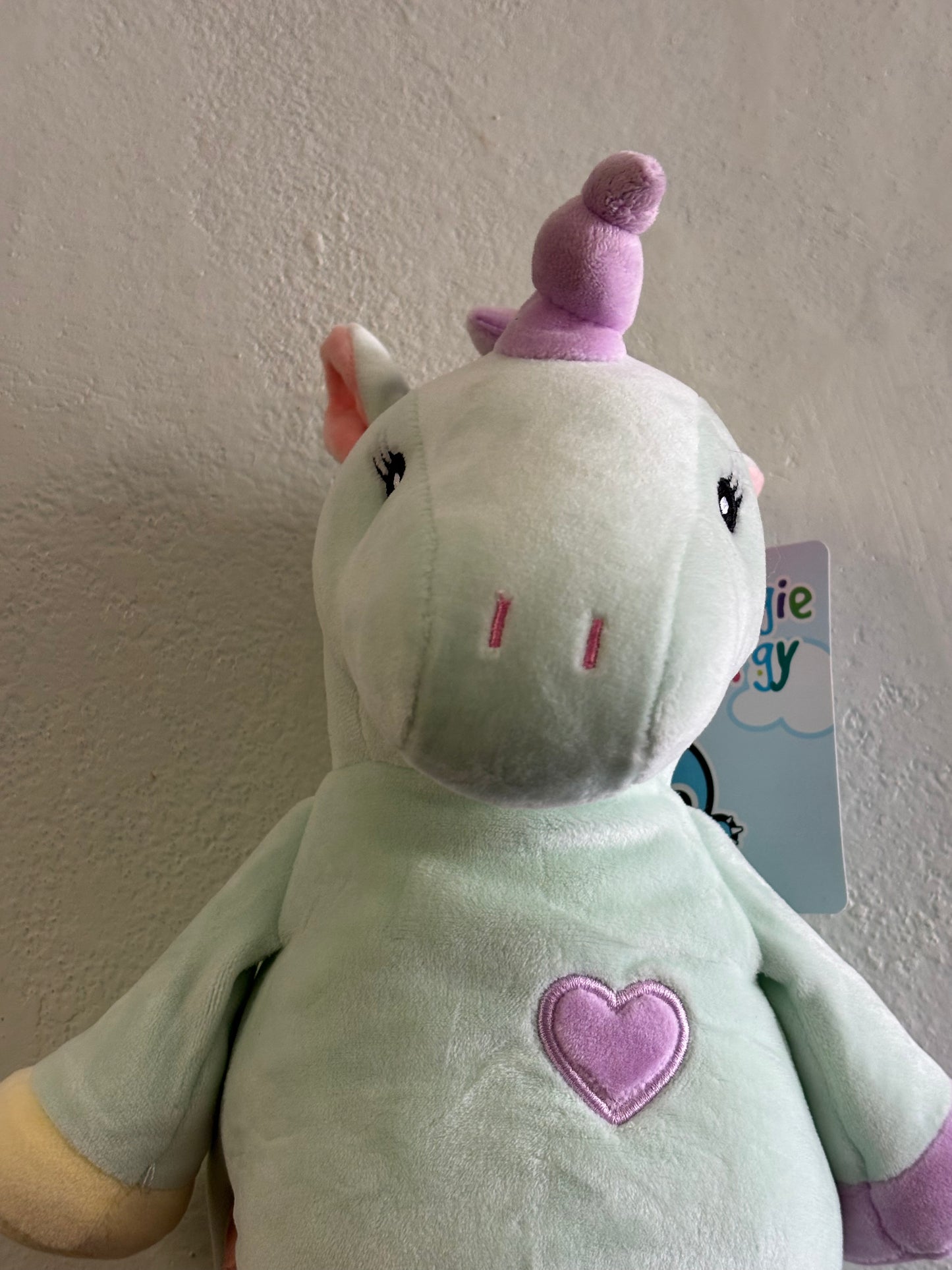 light green unicorn plushie